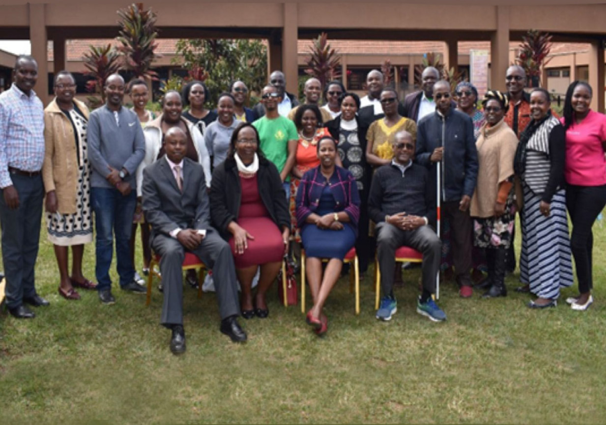 Training workshop participants posing for group photograph