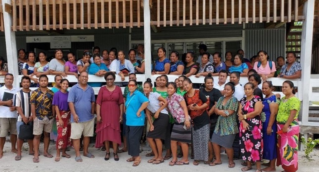 Teachers posing for a group photograph at the workshop.