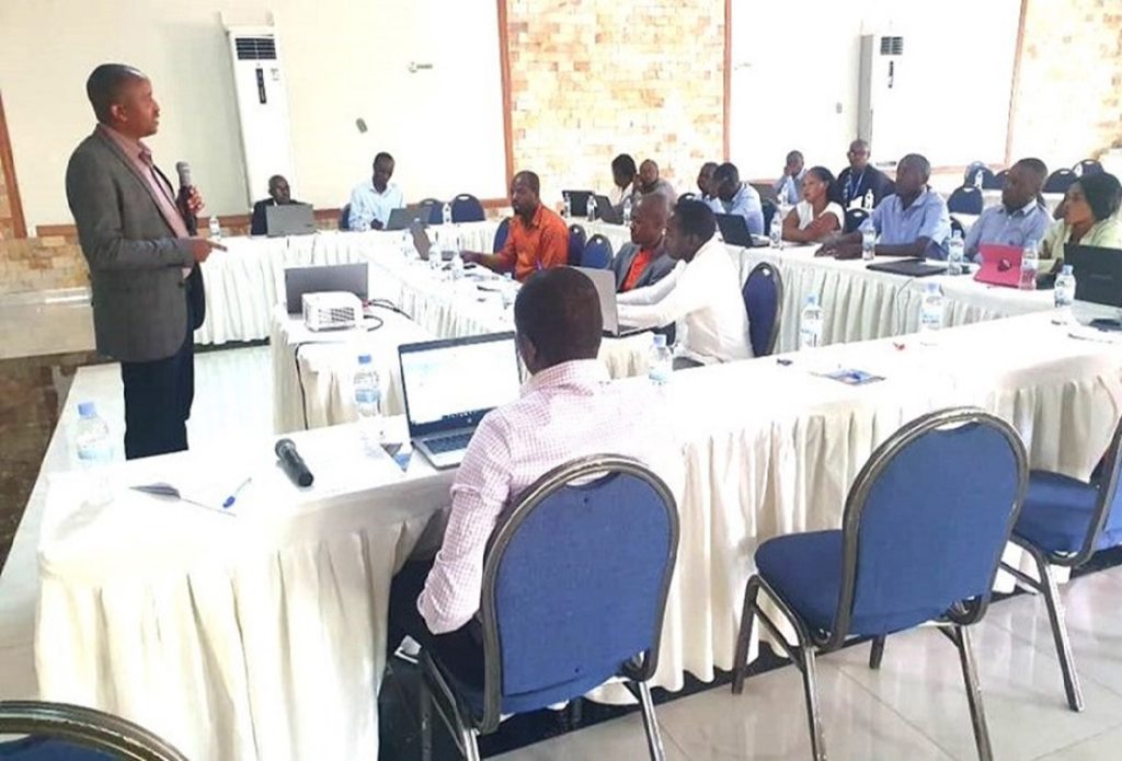 Attendees listening to presenter at the Teacher Education and Training through ODL meeting in Rwanda.